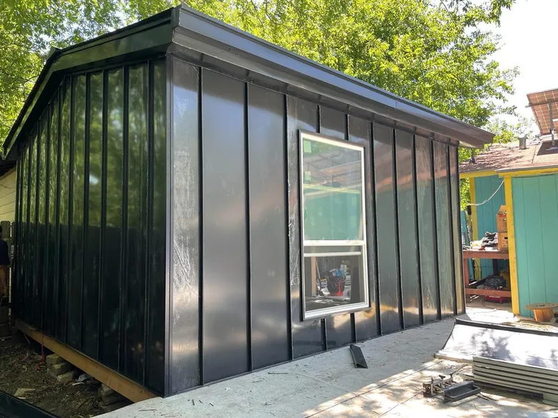 Black standing seam metal wall panels for Roof Inspection in Waimea