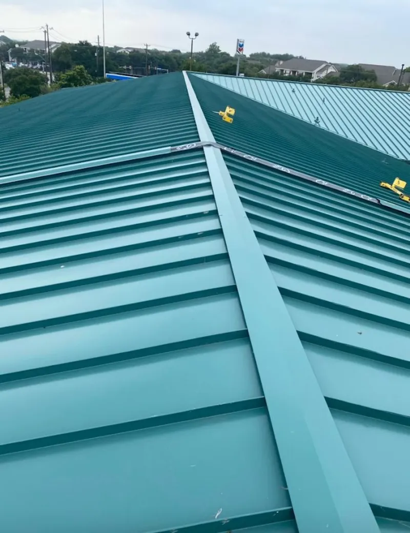 Green commercial metal roof ridge and valley for Metal Roof Repair in Waimea