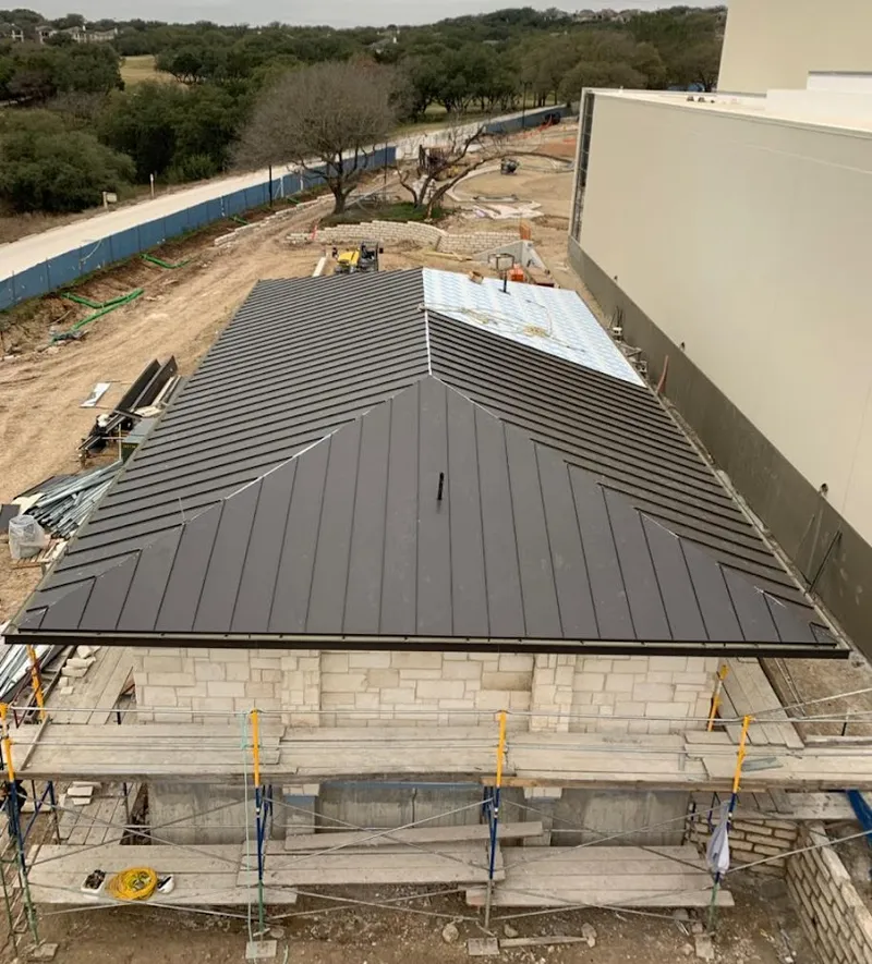 Metal roof new construction with scaffolding in Waimea